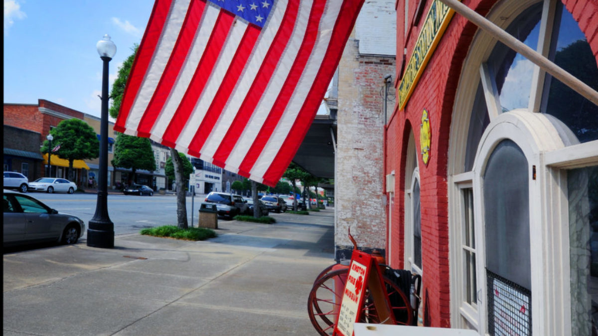 downtown Kinston with American flag