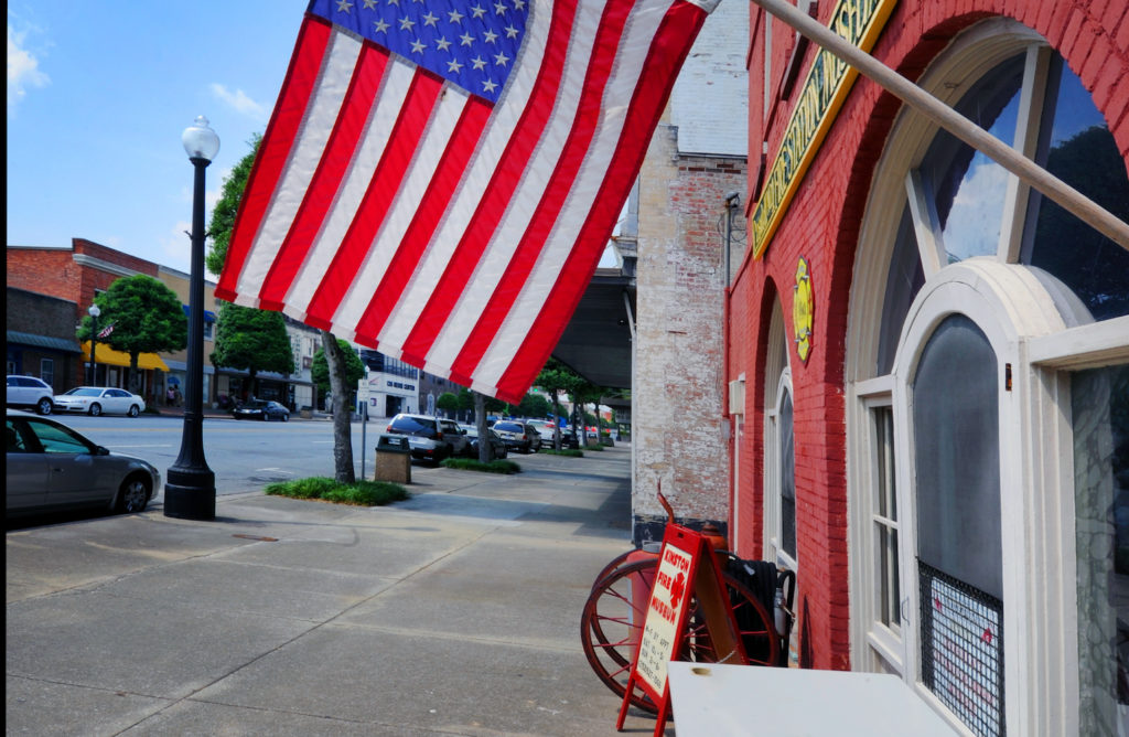 downtown Kinston with American flag
