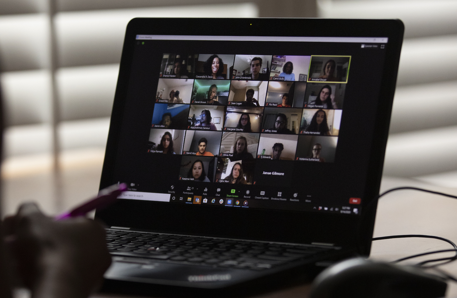 A computer showing students attending class via Zoom