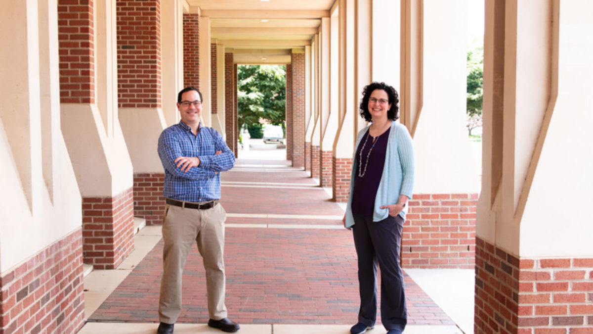 Strahl and Pattenden pose together on campus.