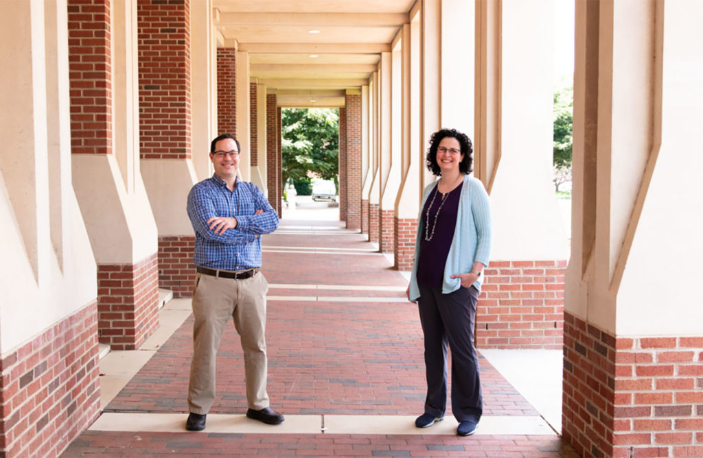 Strahl and Pattenden pose together on campus.