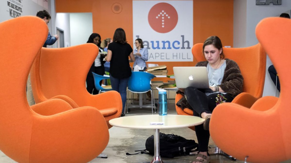 Student sitting in Launch lounge