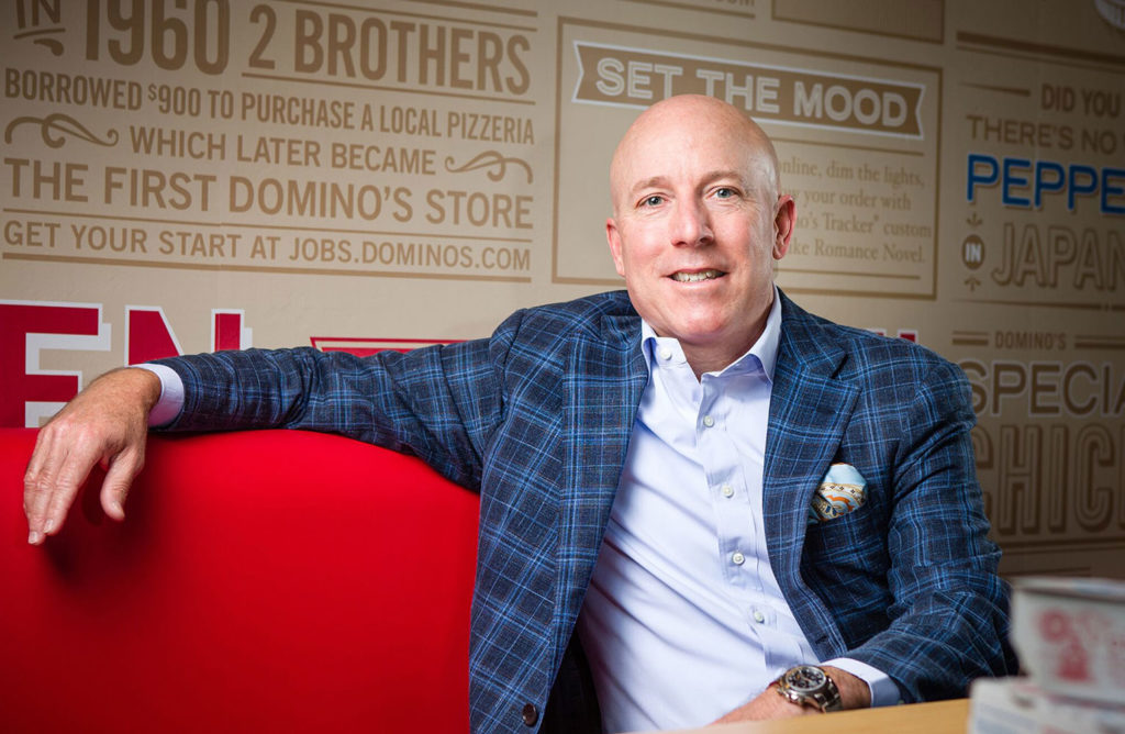 Richard Allison, CEO of Dominos sitting