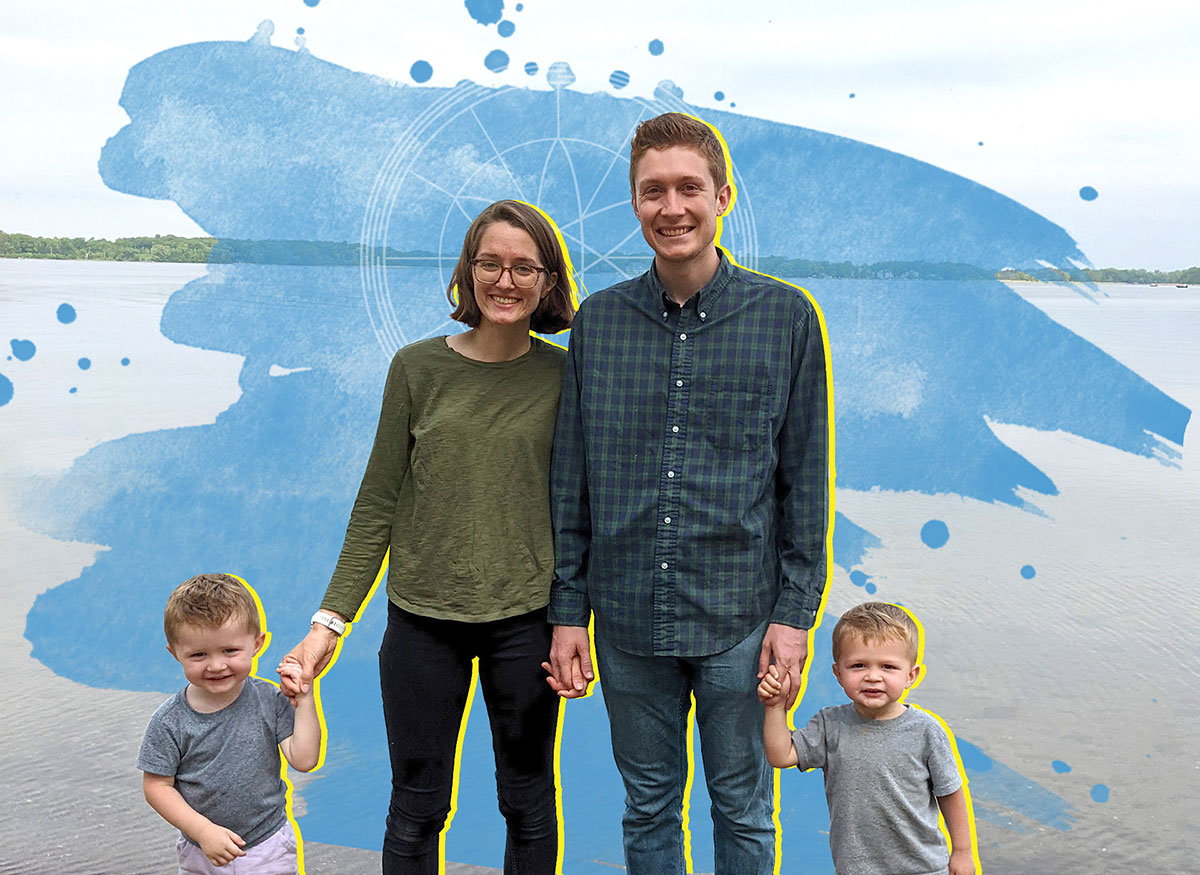 Bryn Barker and DJ Passey hold hands with their twin boys on a beach.