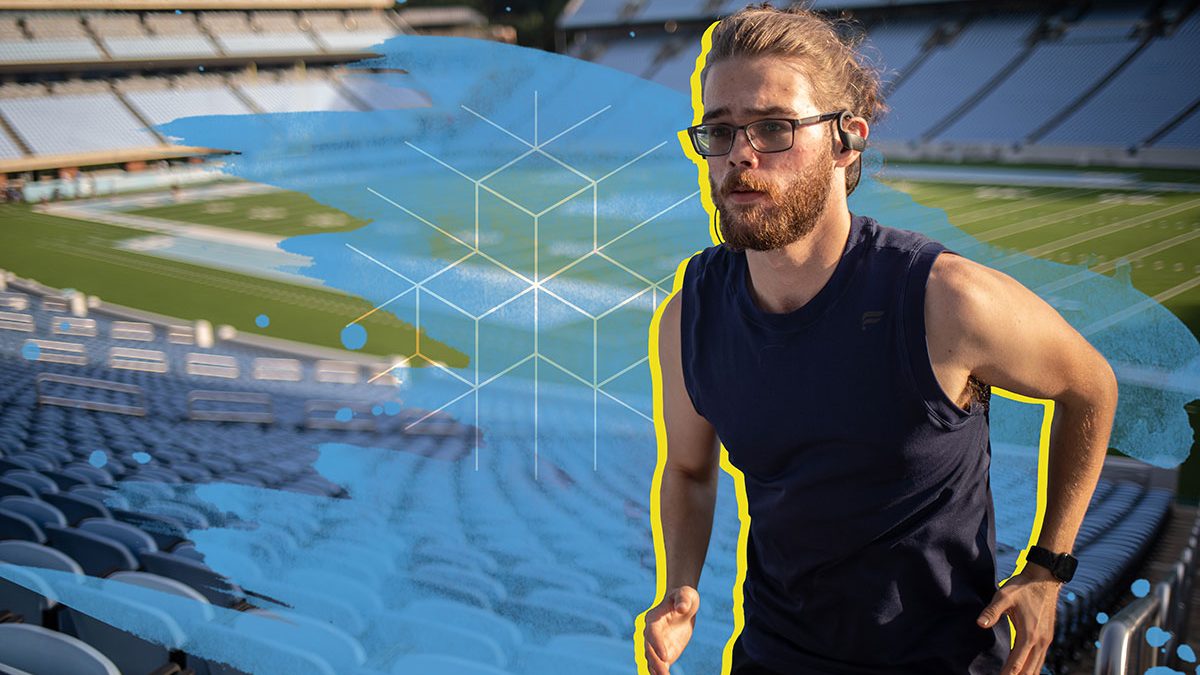 Carolina Covenant Scholar Matthew Wood runs the steps at the football stadium at UNC-Chapel Hill.