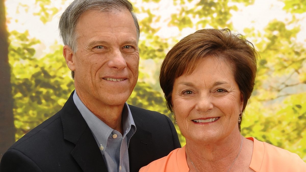 Rick Margerison and his wife in a portrait photo.