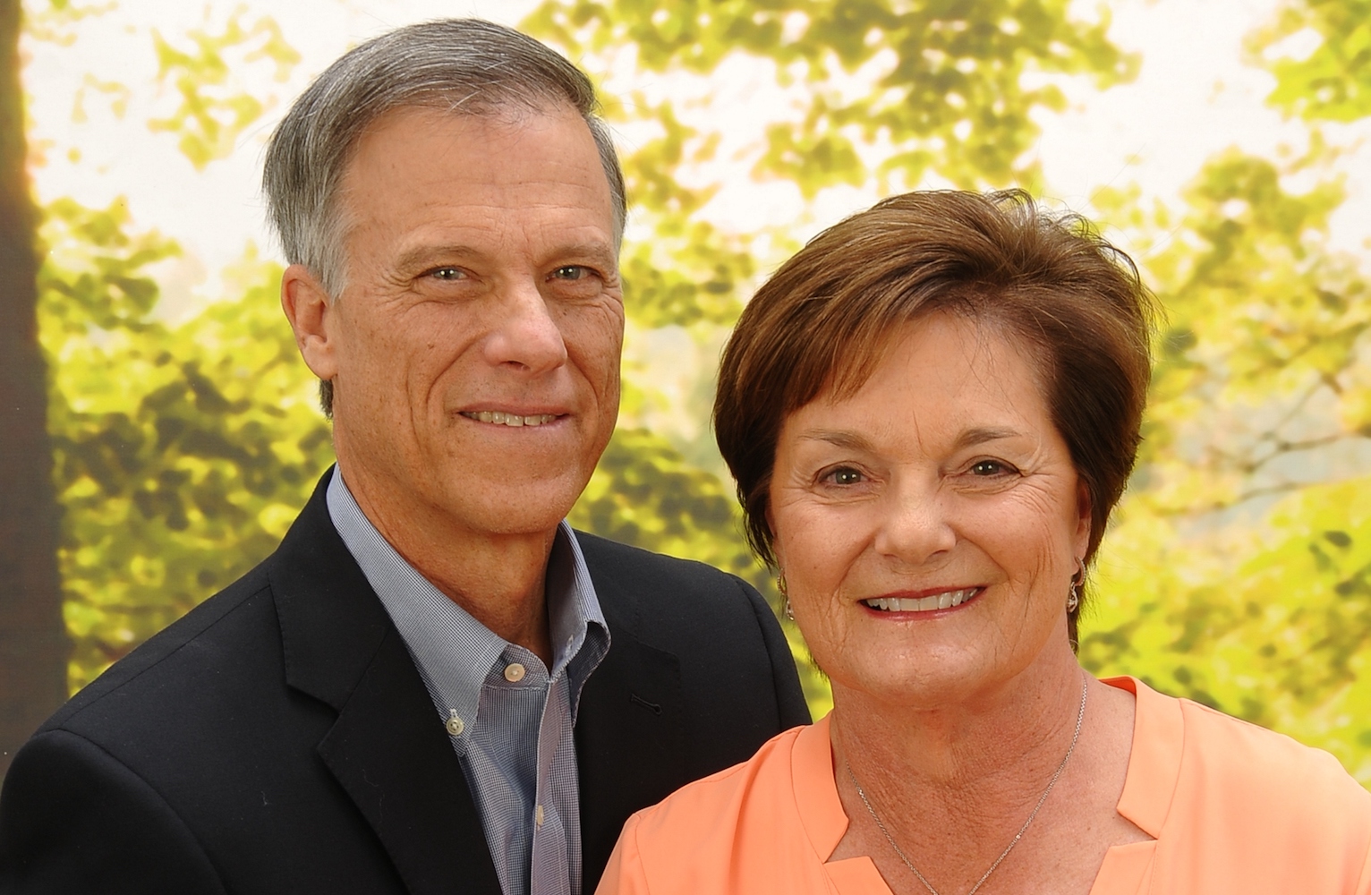 Rick Margerison and his wife in a portrait photo.