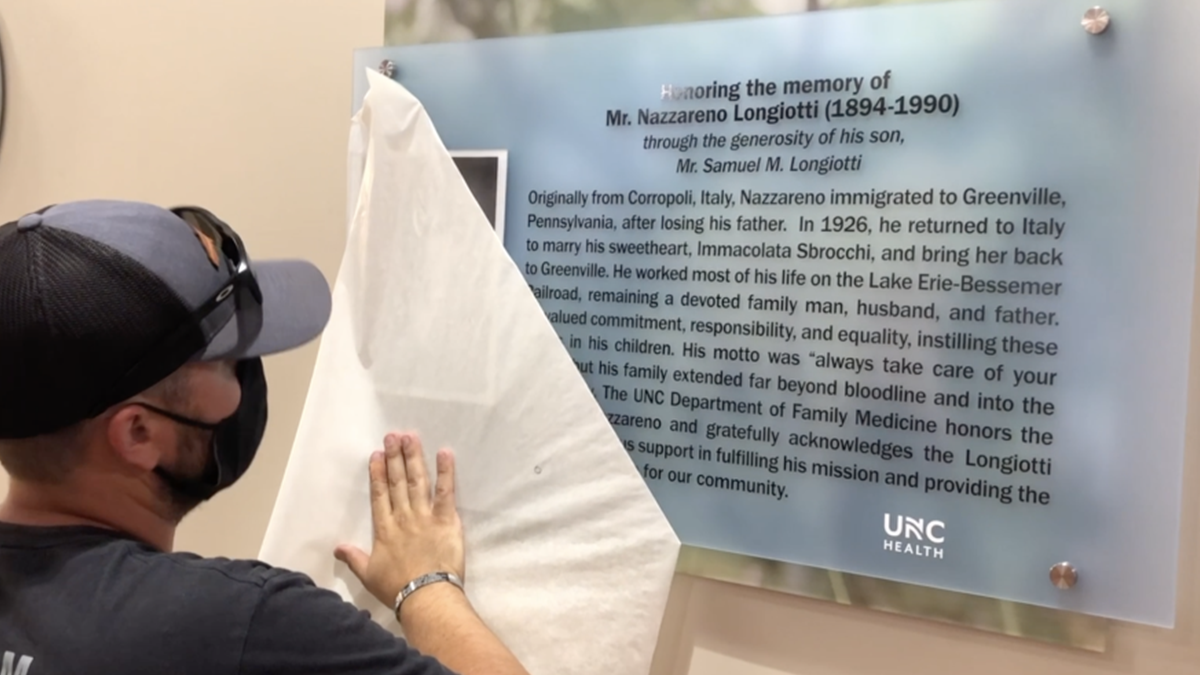 The unveiling of a plaque dedicating the campaign to Longiotti