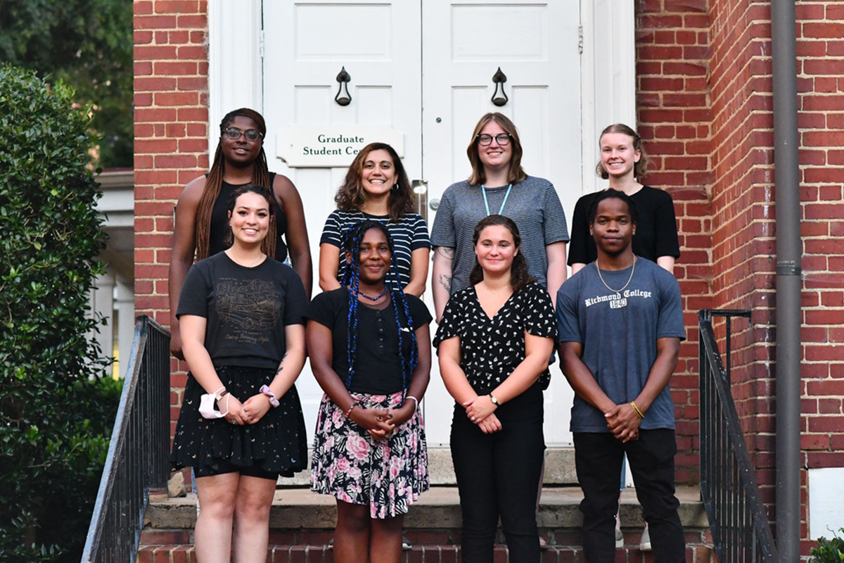 This year's class of Weiss Fellows stand on the steps of the Graduate Center