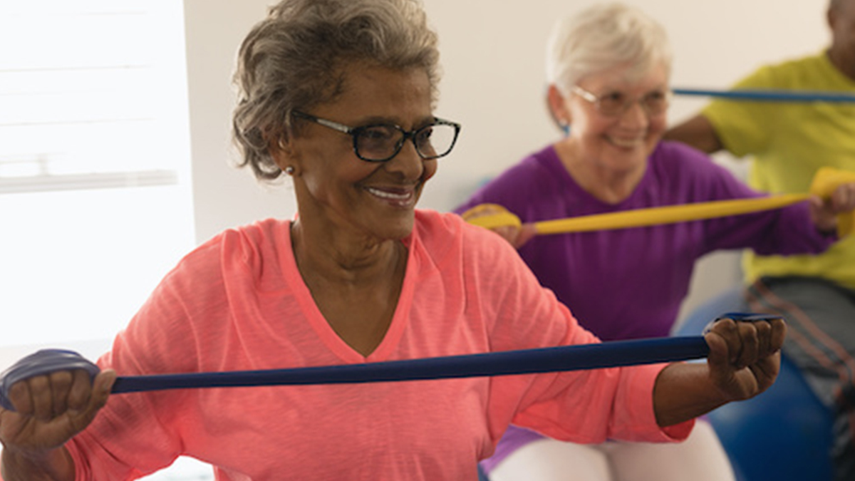 Elderly women participate in an exercise class