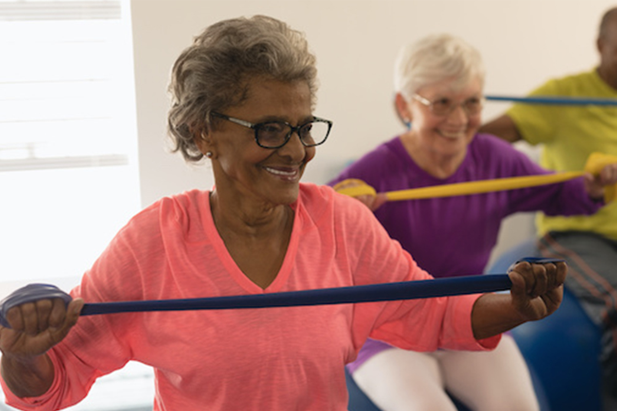 Elderly women participate in an exercise class